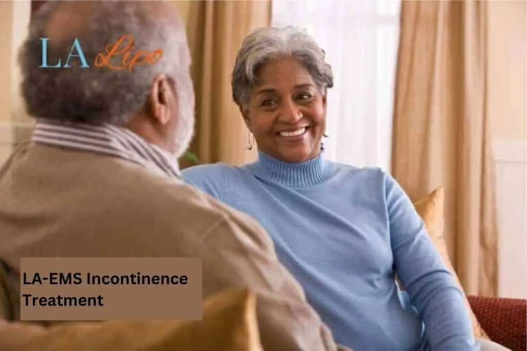 Couple sat smiling at each other - LA-EMS treatment Welwyn Garden City
