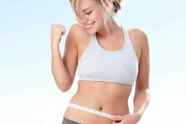 woman happy after fat reduction treatment Welwyn Garden City