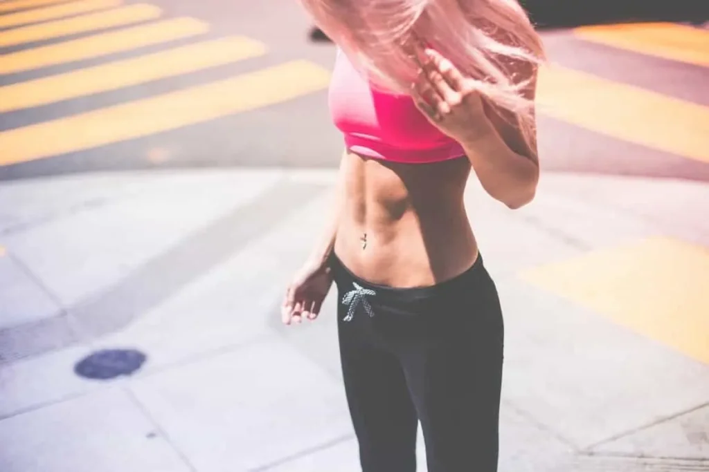 Woman with toned stomach after LA-EMS Body Sculpting Treatment Welwyn Garden City 