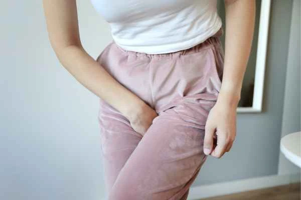 woman running for the toilet because of urinary incontinence Welwyn Garden City